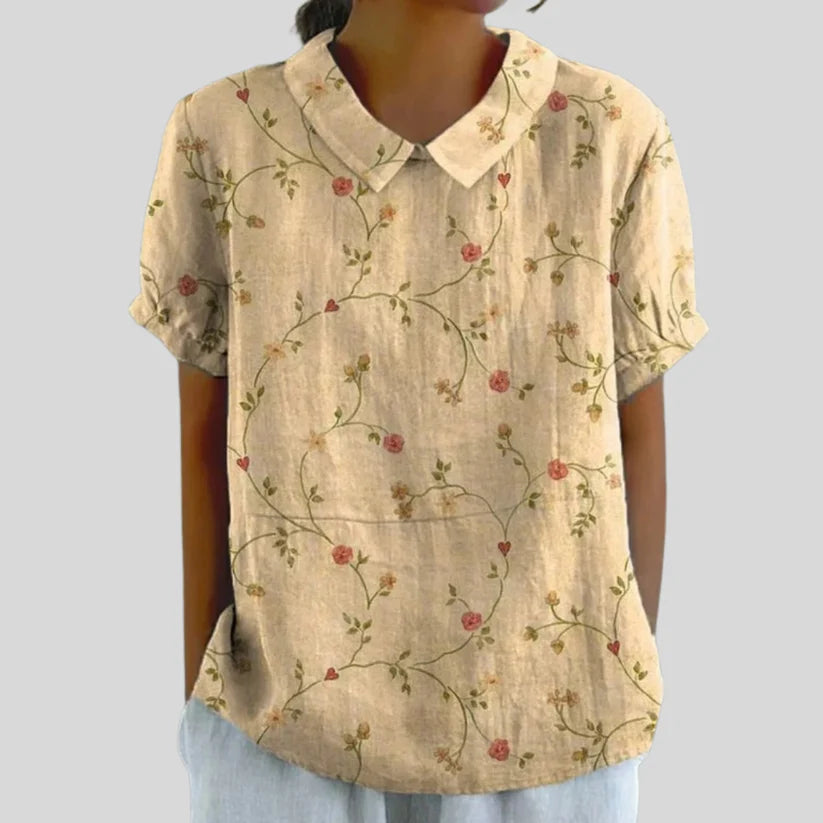 Top elegante, con stampa floreale e comodo.