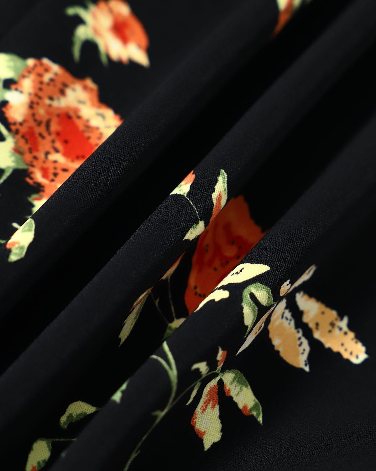 Jenni - Abito nero con scollo a V e stampa floreale
