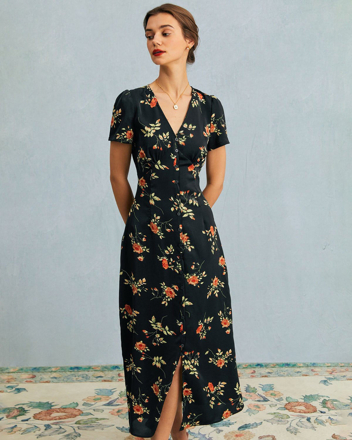 Jenni - Abito nero con scollo a V e stampa floreale