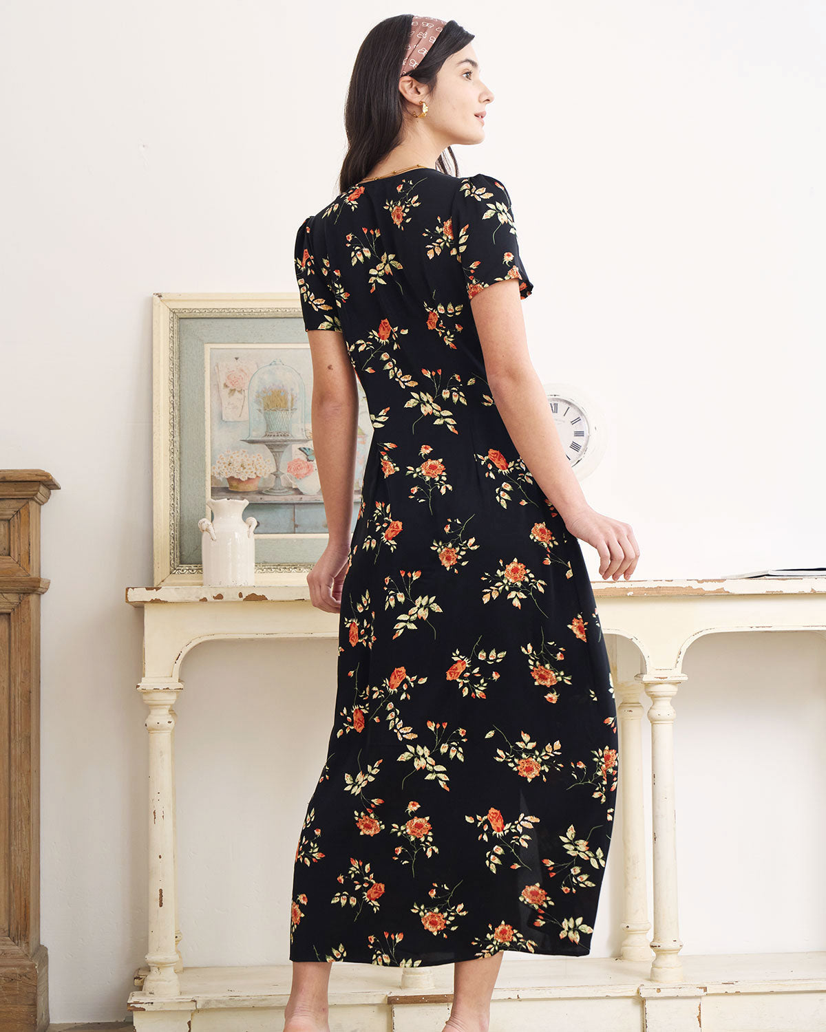 Jenni - Abito nero con scollo a V e stampa floreale