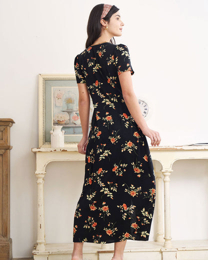 Jenni - Abito nero con scollo a V e stampa floreale