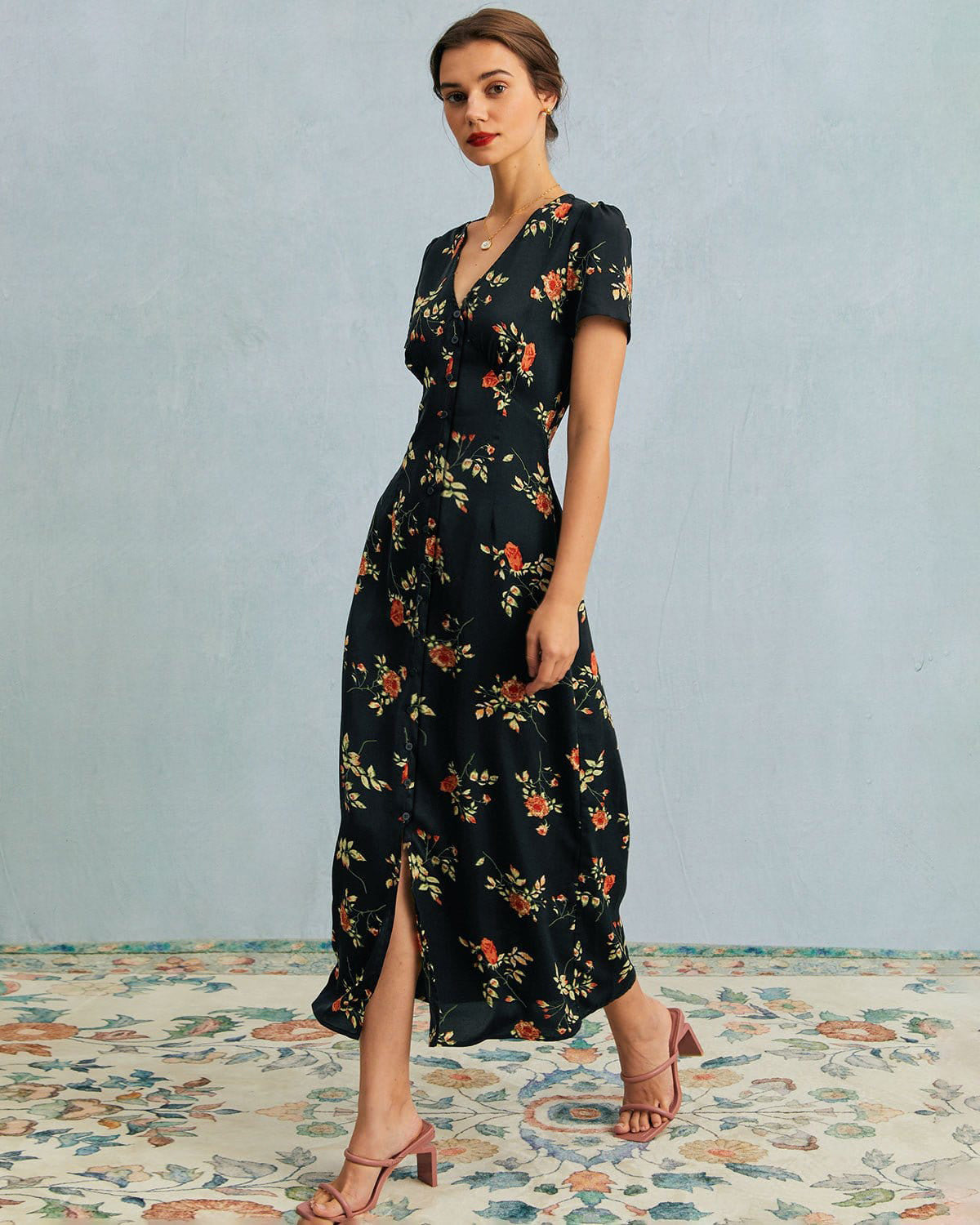 Jenni - Abito nero con scollo a V e stampa floreale
