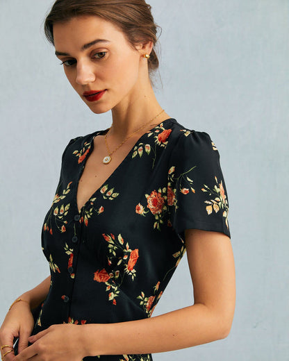 Jenni - Abito nero con scollo a V e stampa floreale