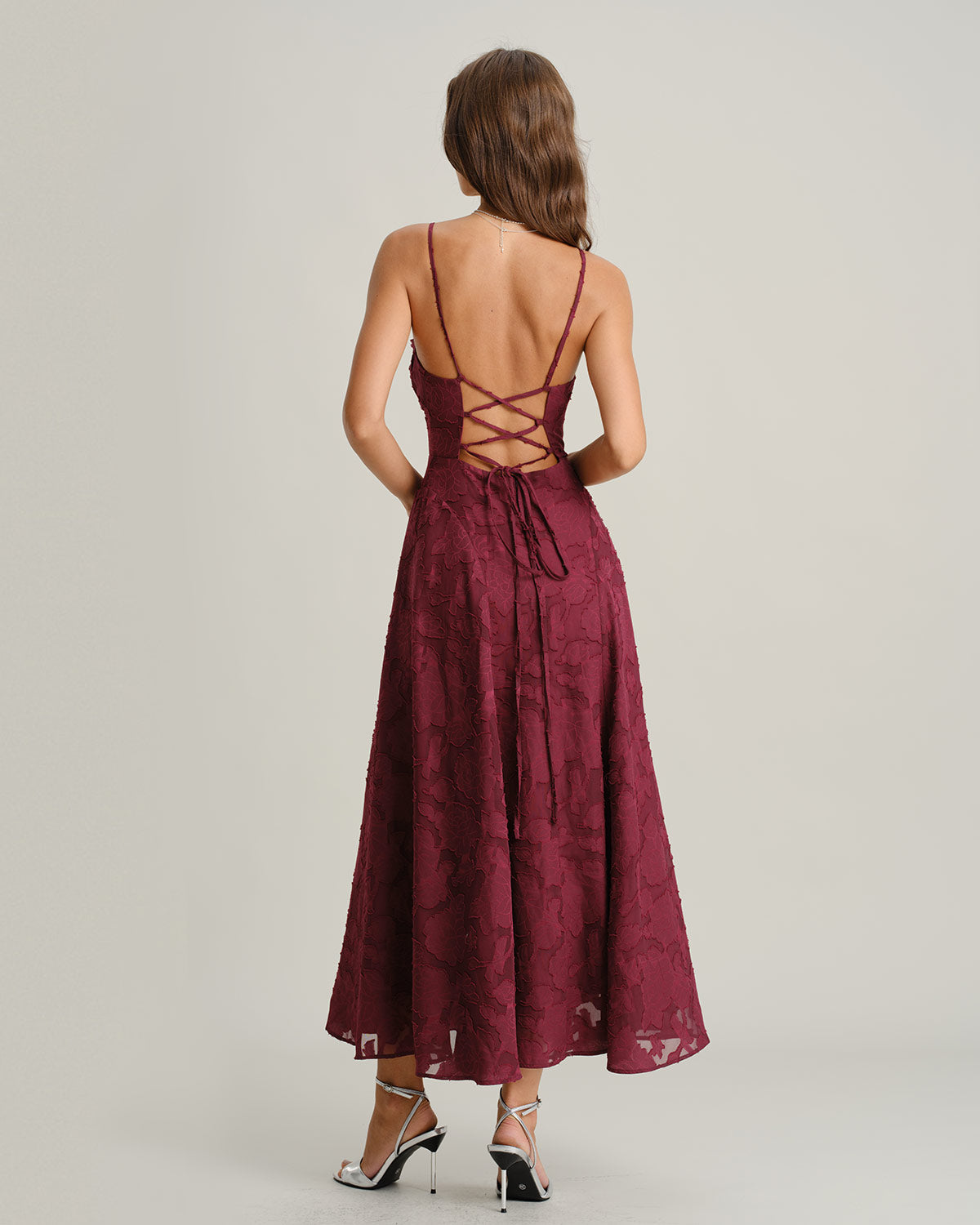 Abito lungo a tubino in jacquard rosso vino